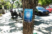 Poster on tree: Every Moment is a new gift! We always get another moment, another opportunity. That's the wonderful richness of life!